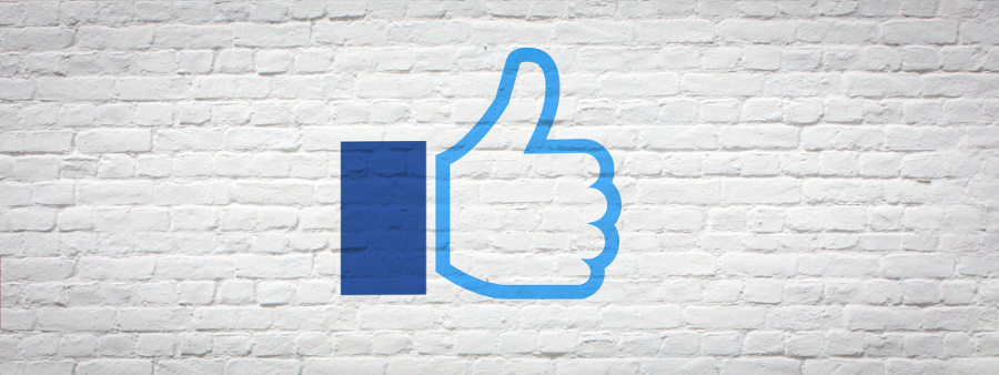 Facebook thumbs up on wall